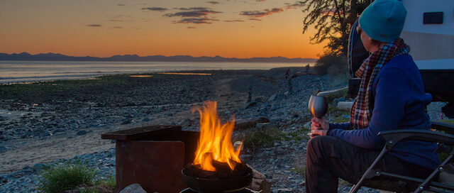 Hygge & RV - Propane fireplace at sunset on a beach